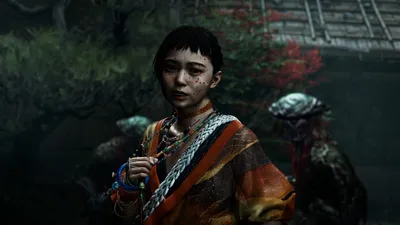 Official Onimusha: Way of the Sword screenshot of a blood-flecked young woman in an embroidered robe holding a beaded charm in a moonlit garden
